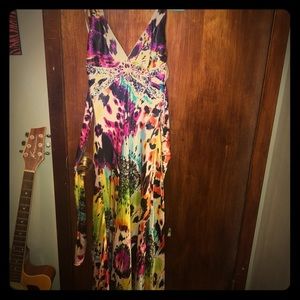 Mermaid form fitting formal over the neck dress